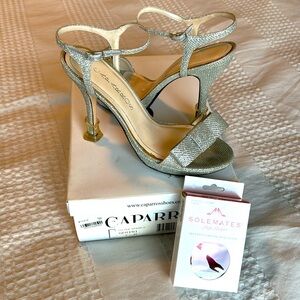 Caparros metallic bow heel 7.5